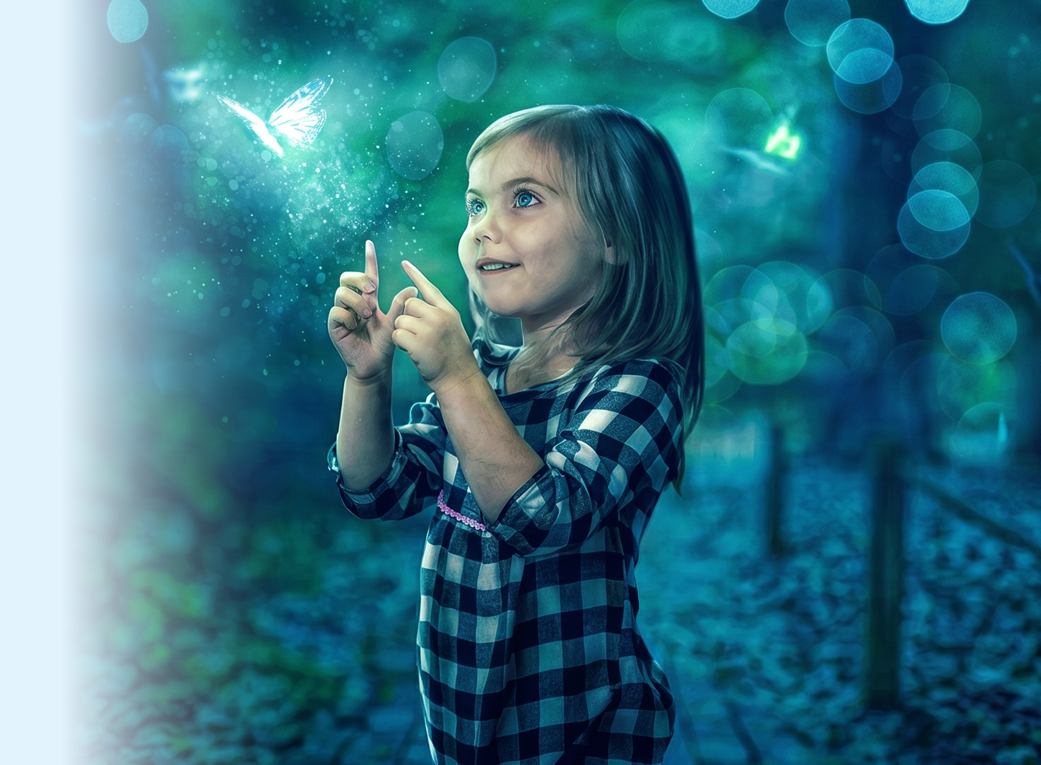 A young girl reaching out toward a butterfly